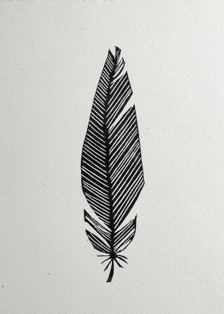 Black leaf silhouette on a white background