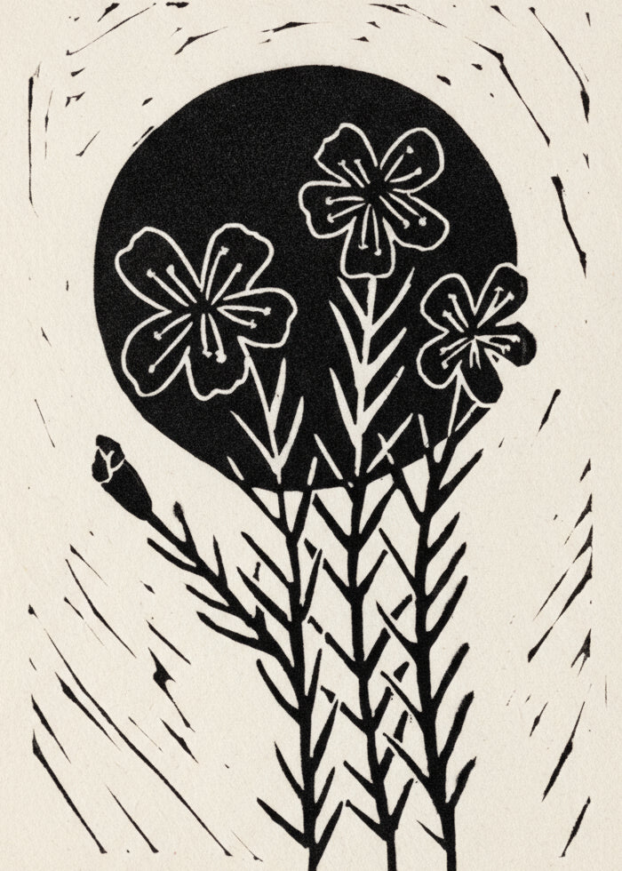 Black and white floral design with a circular background on a white background