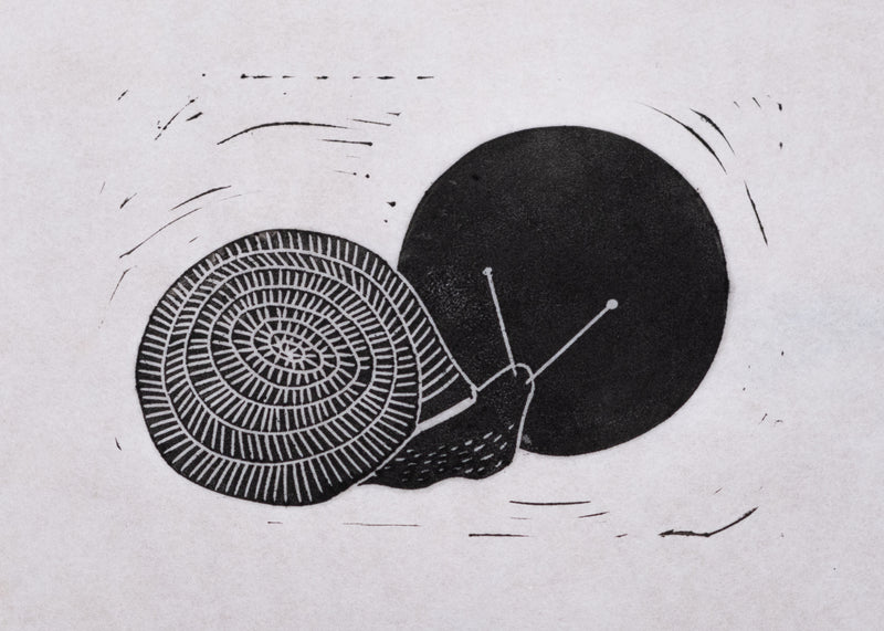 Black and white illustration of a snail on a light gray background