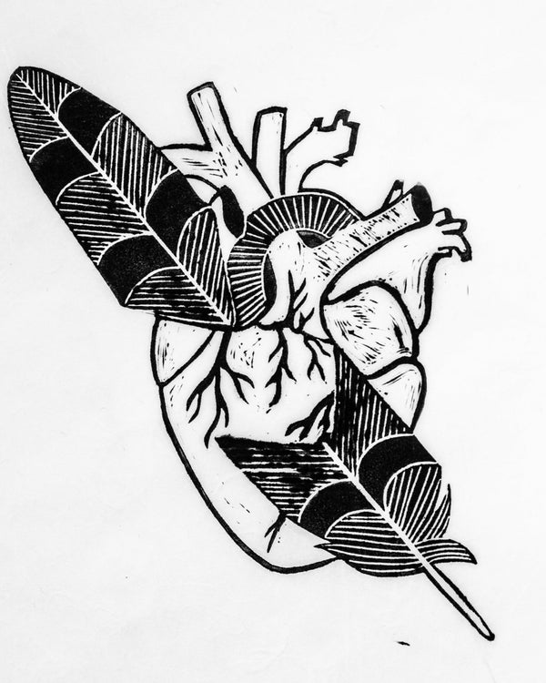 Black and white illustration of a heart with feathers on a white background