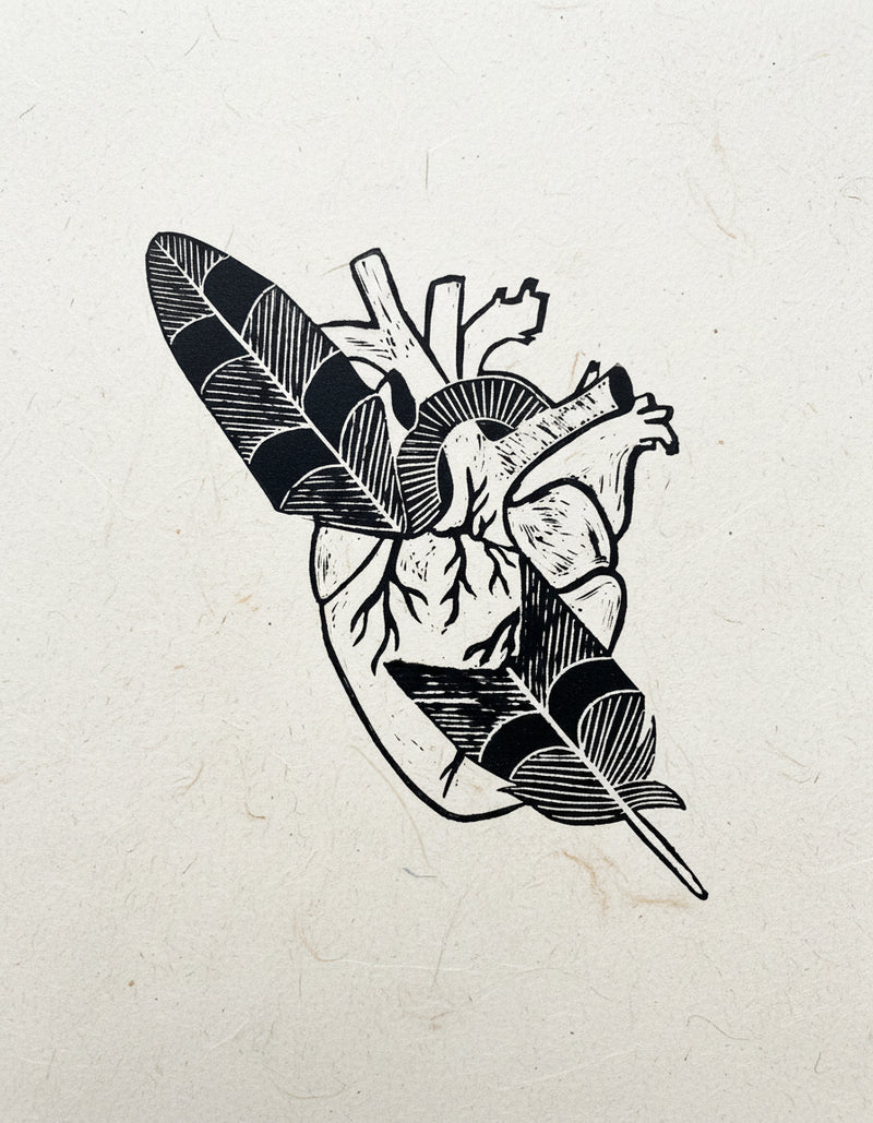Black and white illustration of a heart pierced with a hawk feather on a light gray background