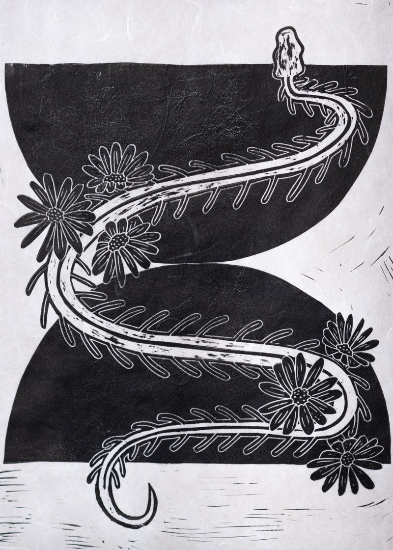 Decorative design with black half-circles, the skeleton of the endangered pine snake, and flowers on a textured gray background