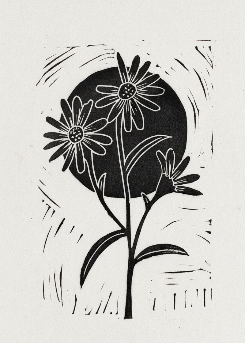 Black floral silhouette on a white background